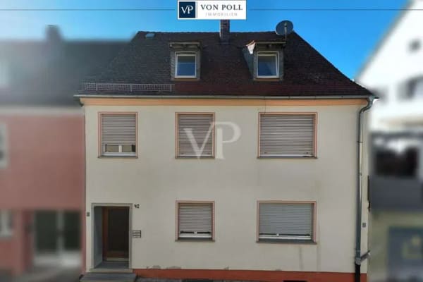 Immobilie in Kitzingen - Mehrfamilienhaus mit Entwicklungspotenzial in Stadtmitte Kitzingen - Bild 0