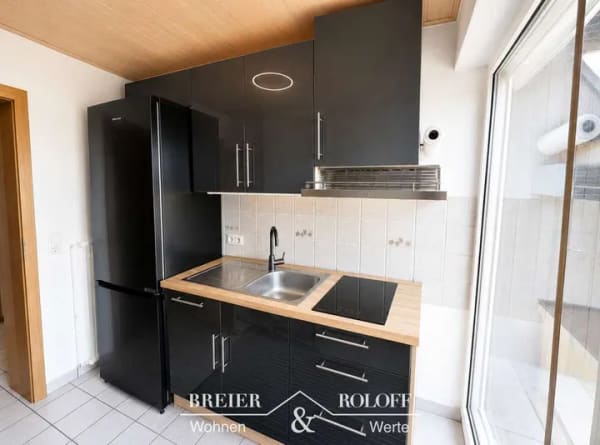 Immobilie in Heeßen - Wohnen mit Weitblick:
2-Zimmer-Dachgeschosswohnung mit Gartenterrasse in Heeßen - Bild 3