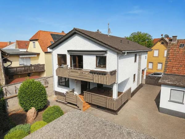 Immobilie in Biblis - Großzügiges Einfamilienhaus mit Garten, Balkon & Garage in ruhiger Lage von Biblis - Bild 1
