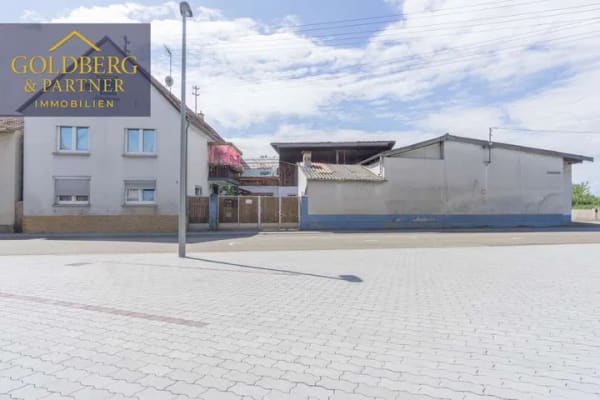 Immobilie in Neupotz - Großzügiges Doppelhaus mit zwei Wohneinheiten, Werkstatt, Scheunen und ca. 800 m² Grundstück in Neup - Bild 0
