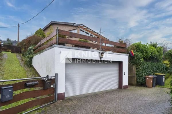 Immobilie in Overath - +++ 3710 - Einfamilienhaus mit Doppelgarage in ruhiger Lage von Overath-Oberbrombach +++ - Bild 1