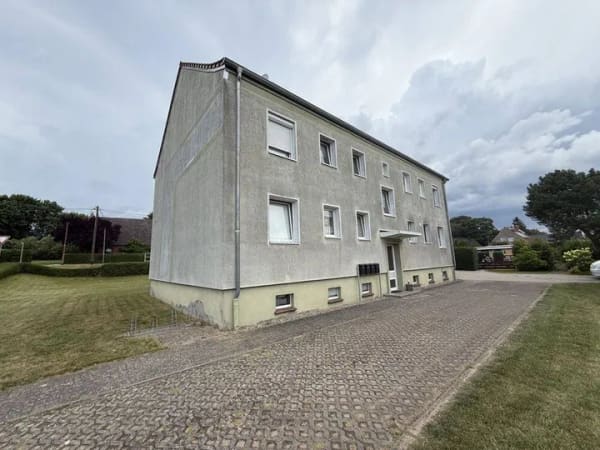 Immobilie in Plate - Kapitalanlage mit Mehrwert: Vermietete 3-Zimmer-Wohnung mit Garten & Garage - Bild 1