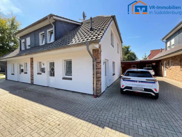 Immobilie in Bösel - Jetzt frei: Familienglück in Bösel! Moderne Doppelhaushälfte mit Carport. - Bild 0