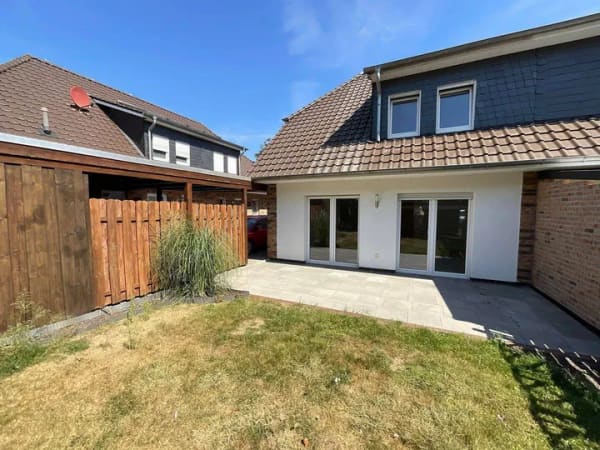 Immobilie in Bösel - Jetzt frei: Familienglück in Bösel! Moderne Doppelhaushälfte mit Carport. - Bild 1