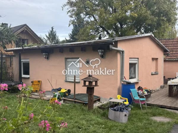 Immobilie in München - Teilrenoviertes Haus zu verkaufen, renovierungsbedürftig - Bild 1