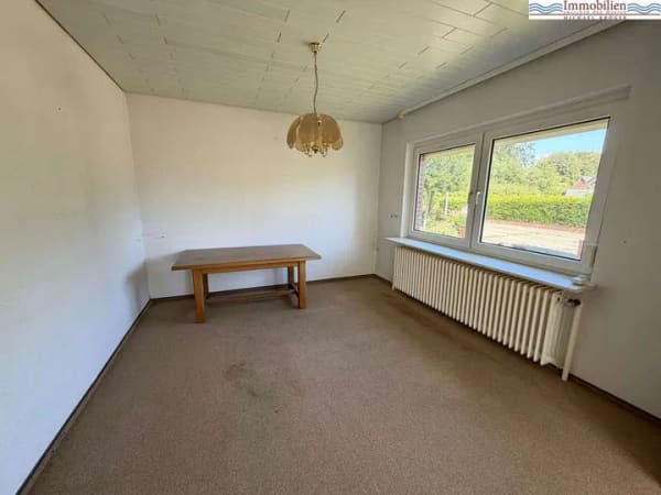 Immobilie in Mildstedt - Massives Einfamilienhaus mit großem Grundstück und viel Potenzial in ruhiger Wohnlage von Mildstedt - Bild 3