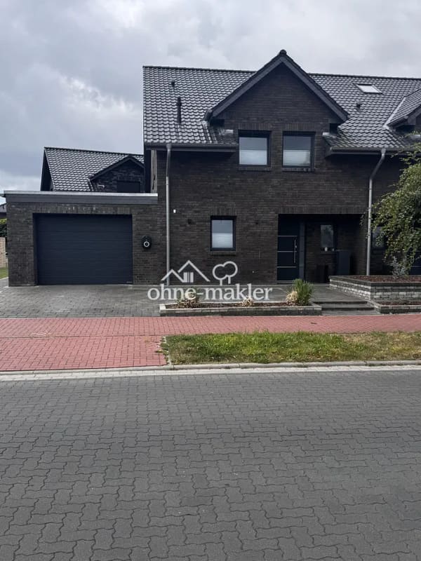 Immobilie in Burweg - Moderne Doppelhaushälfte mit beheizter Garage, hochwertige Ausstattung mit Top-Energiewert - Bild 1