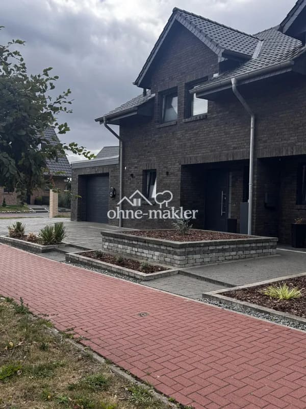 Immobilie in Burweg - Moderne Doppelhaushälfte mit beheizter Garage, hochwertige Ausstattung mit Top-Energiewert - Bild 2