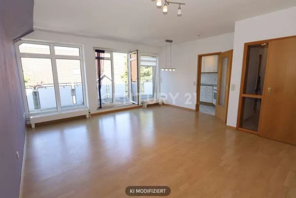 Immobilie in Schüttorf - Gut geschnittene Dachgeschosswohnung mit gr. Südwest Balkon - Bild 1