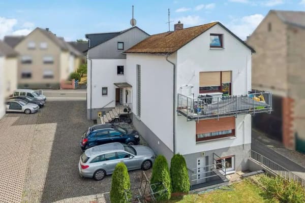 Immobilie in Rettert - Gepflegtes Mehrfamilienhaus mit vier Wohneinheiten und zusätzlichem Entwicklungspotenzial! - Bild 2