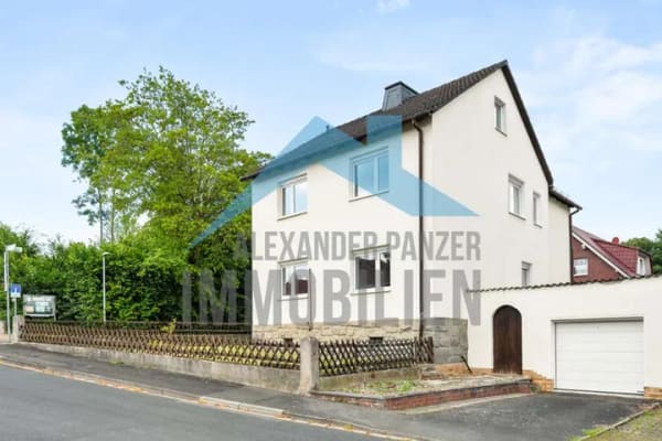 Immobilie in Ahnatal - Renovierungsbedürftiges Zweifamilien mit Keller und Garage in ruhiger Wohnlage von Ahnatal-Weimar! - Bild 0