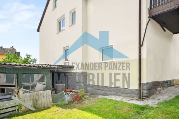 Immobilie in Ahnatal - Renovierungsbedürftiges Zweifamilien mit Keller und Garage in ruhiger Wohnlage von Ahnatal-Weimar! - Bild 2
