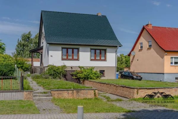 Immobilie in Velgast - Gepflegtes Einfamilienhaus mit beheizter Doppelgarage und viel Potenzial - Bild 1