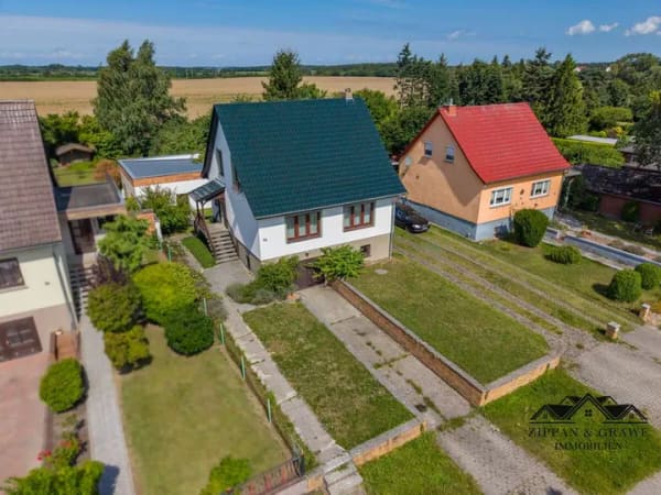 Immobilie in Velgast - Gepflegtes Einfamilienhaus mit beheizter Doppelgarage und viel Potenzial - Bild 2
