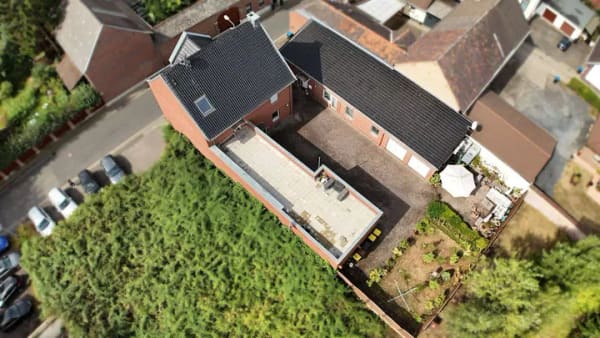 Immobilie in Bedburg - Gepflegtes Mehrfamilienhaus mit 5 Wohneinheiten und 4 Garagen - Bild 1