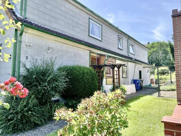 Immobilie in Bad Harzburg - Viel Platz, viele Möglichkeiten Ein-/Zweifamilienhaus mit 3 Garagen & Dachterrasse - Bild 2