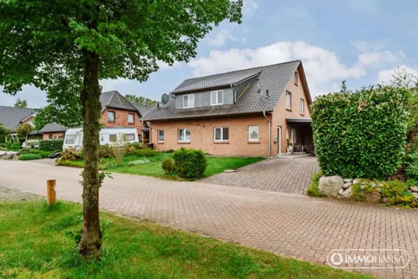Immobilie in Eyendorf - Vollständig ausgebaute Doppelhaushälfte mit Carport *gepflegt und familienfreundlich* - Bild 0
