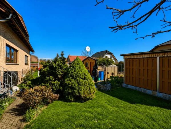 Immobilie in Doberschütz - Wohnen mit vielen Möglichkeiten – Einliegerwohnung, Wintergarten, Kamin & PV-Anlage - Bild 3