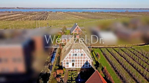 Immobilie in Grünendeich - Aufwendig saniertes Fachwerk-Unikat in direkter Elbnähe zum Kauf in Grünendeich - Wentzel Dr. - Bild 1