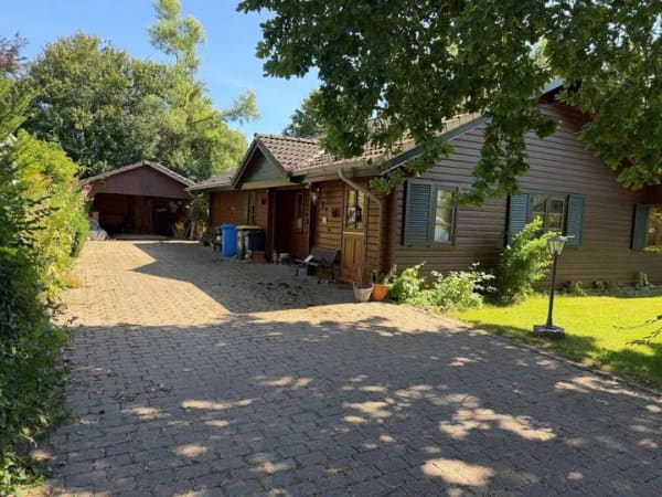 Immobilie in Süderheistedt - Idylisch in die Natur eingebettetes Holzhaus in Süderheistedt - Bild 0