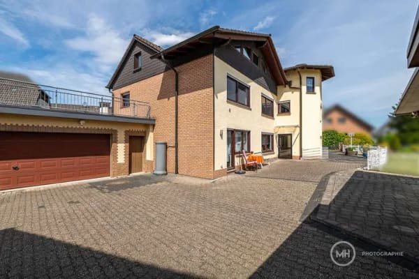 Immobilie in Hennef (Sieg) - MANNELLA *Raum für neue Möglichkeiten* Gepflegtes Zweifamilienhaus in Hennef-Heisterschoss. - Bild 3
