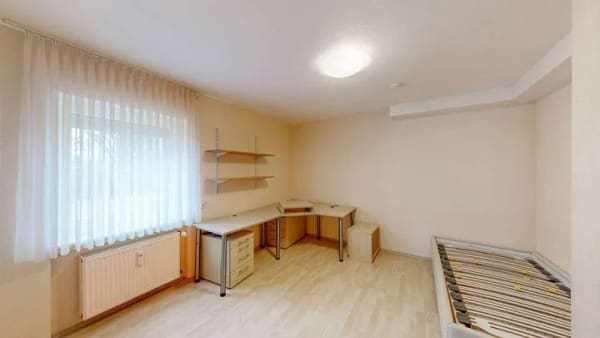 Immobilie in Eußenheim - Viel Raum für Ideen – Zweifamilienhaus mit großem Ausbaupotenzial und Werkstatt-/Ausbaureserve - Bild 3