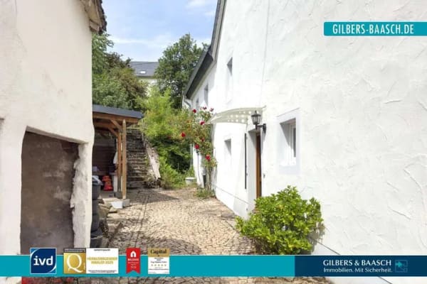 Immobilie in Herl - Herl: charmantes Einfamilienhaus mit schönem Außenbereich und Ausbaupotenzial - Bild 0
