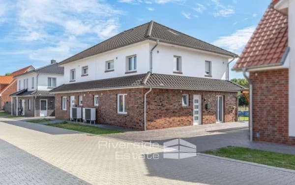 Immobilie in Sulingen - Sulingen | Neuwertige Doppelhaushälfte mit KfW-40-Standard, Wärmepumpe & Garten - Bild 1