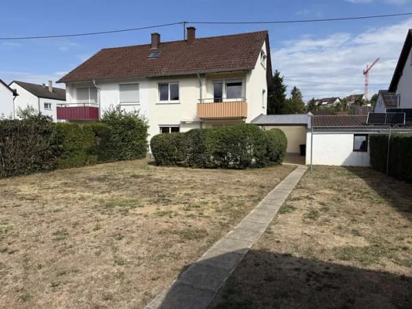 Immobilie in Gomaringen - Charmante Doppelhaushälfte mit schönem Garten und großer Garage - Bild 2