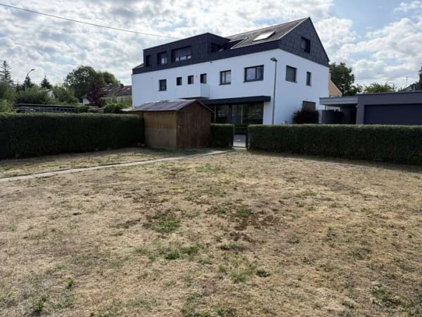 Immobilie in Gomaringen - Charmante Doppelhaushälfte mit schönem Garten und großer Garage - Bild 3
