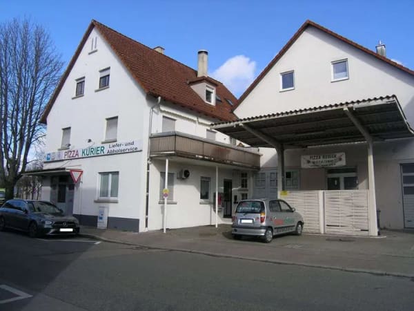 Immobilie in Göppingen - Wohn- und Geschäftshaus mit 2 Wohneinheiten und 1 Gewerbeeinheit - Bild 1