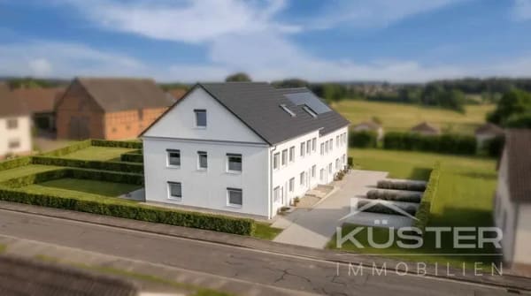 Immobilie in Wölpinghausen - KÜSTER IMMOBILIEN präsentiert:Energieeffizientes Neubau-Reihenmittelhaus mit viel Platz für Familien - Bild 1