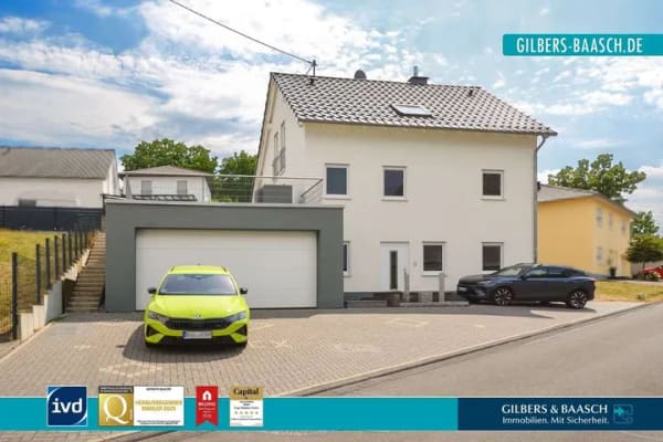 Immobilie in Bekond - Bekond: Junges Einfamilienhaus, Wärmepumpe, Wintergarten und große Garage mit Platz für mehrere PKW - Bild 0
