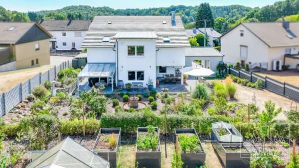 Immobilie in Hilst - Ein Wohntraum trifft Gartenidylle - hochwertige Immobilie mit KfW-55 Standard in Hilst - Bild 3