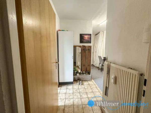 Immobilie in Rosdorf - Vermietete 4-Zimmer-Eigentumswohnung mit Balkon und Aufzug in Rosdorf bei Göttingen - Bild 1