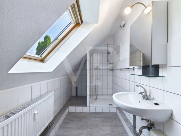 Immobilie in Hage - Gemütliche Dachgeschosswohnung mit großzügiger Dachterrasse in guter Wohnlage von Hage - Bild 4