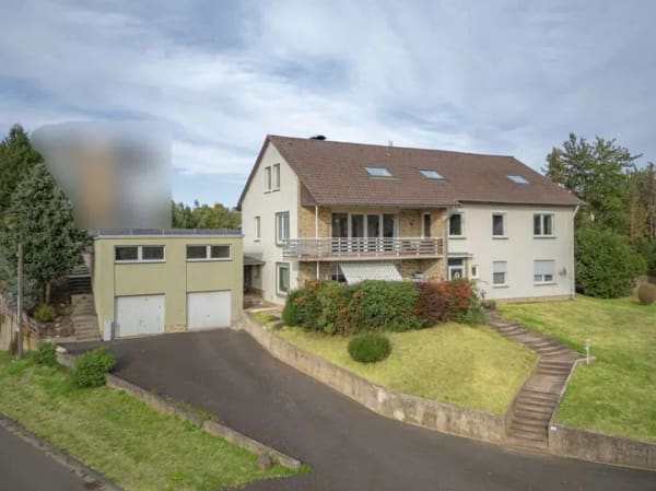 Immobilie in Baunatal - Dreifamilienhaus Kirchbauna: Renditeobjekt mit Doppelgarage, 7 Stellplätzen, großzügigem Garten - Bild 0