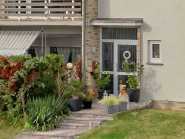 Immobilie in Baunatal - Dreifamilienhaus Kirchbauna: Renditeobjekt mit Doppelgarage, 7 Stellplätzen, großzügigem Garten - Bild 2