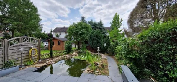 Immobilie in Hambühren - Beste Nachbarschaft, schönes Haus, schöner Garten, Vollkeller, Garage und sehr viel Grün und Ruhe - Bild 1