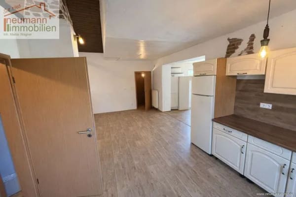 Immobilie in Puderbach - Großzügiges Einfamilienhaus mit modernem Anbau und viel Potenzial - Bild 4