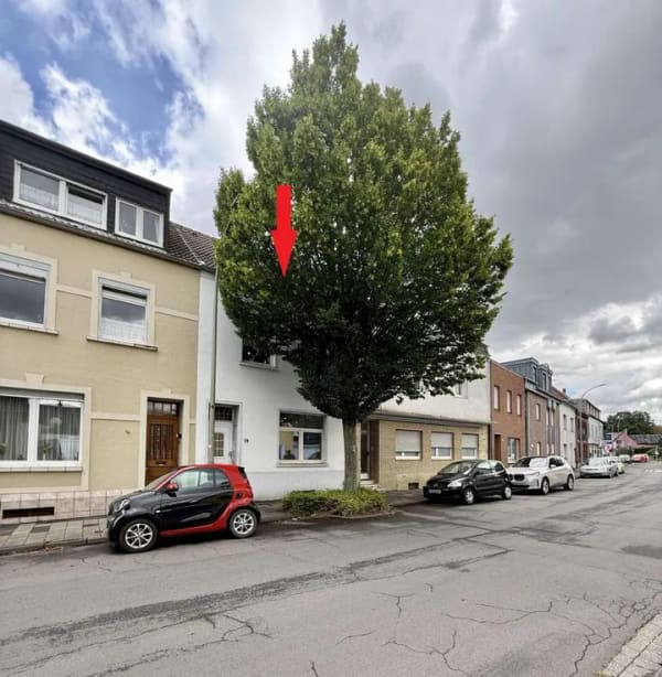 Immobilie in Hückelhoven - Sanierungsbedürftiges Reihenmittelhaus mit Garten und Carport in Hückelhoven-Baal - Bild 1
