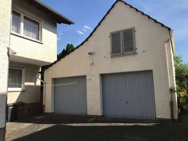 Immobilie in Florstadt - Freistehendes Zweifamilienhaus - Selbstnutzung im EG und OG vermietet - mit Garten und Freisitz - Bild 2