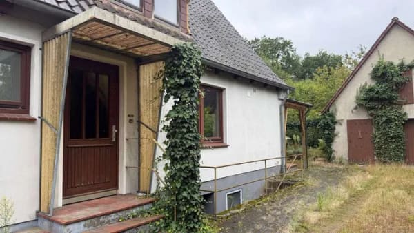 Immobilie in Bienenbüttel - Einfamilienhaus mit großzügigem Garten und separatem Nebengebäude - Bild 1