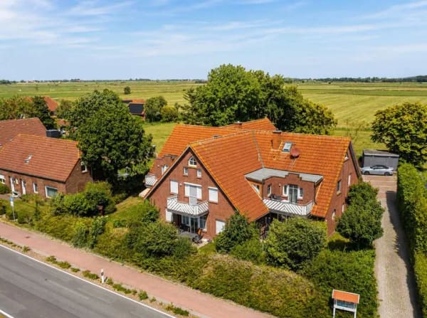 Immobilie in Werdum - Maritimes Flair: Erdgeschosswohnung mit Südterrasse - Bild 1