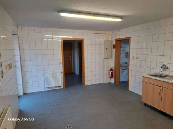Immobilie in Neckarzimmern - 2,5-Zimmer-Wohnung in Neckarzimmern mit Tiefgaragenstellplatz - Bild 1