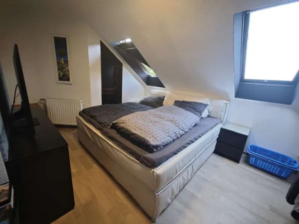 Immobilie in Ubstadt-Weiher - Vermietete 2,5-Zimmer-Dachgeschosswohnung mit Loggia, Garage und Gartenanteil in Ubstadt-Weiher - Bild 3