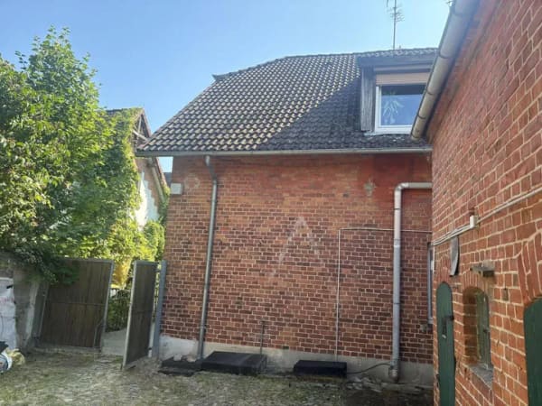Immobilie in Lüchow - Mehrfamilienhaus mit vier kleinen Wohneinheiten und Nebengebäude - Bild 3