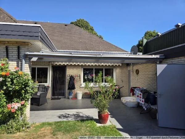 Immobilie in Klein Berßen - Gepflegter Winkelwalmdachbungalow in Klein Berßen! - Bild 2
