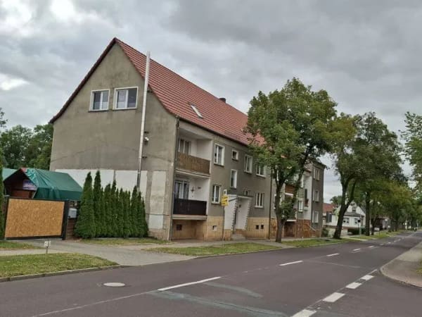 Immobilie in Aschersleben - 4-Raum-Eigentumswohnung mit Balkon, Gartenanteil, 2 Kellerräumen und Garage  in Schackenthal - Bild 1