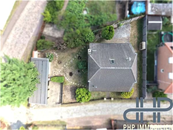 Immobilie in Möser - Familienfreundliches Einfamilienhaus mit Kaminofen, Carport und gepflegtem Garten in ruhiger Lage - Bild 1